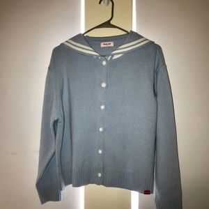 Very cute sky blue sweater